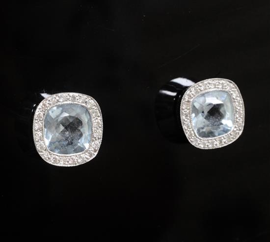 A modern pair of 18ct white gold, diamond and aquamarine ear studs,